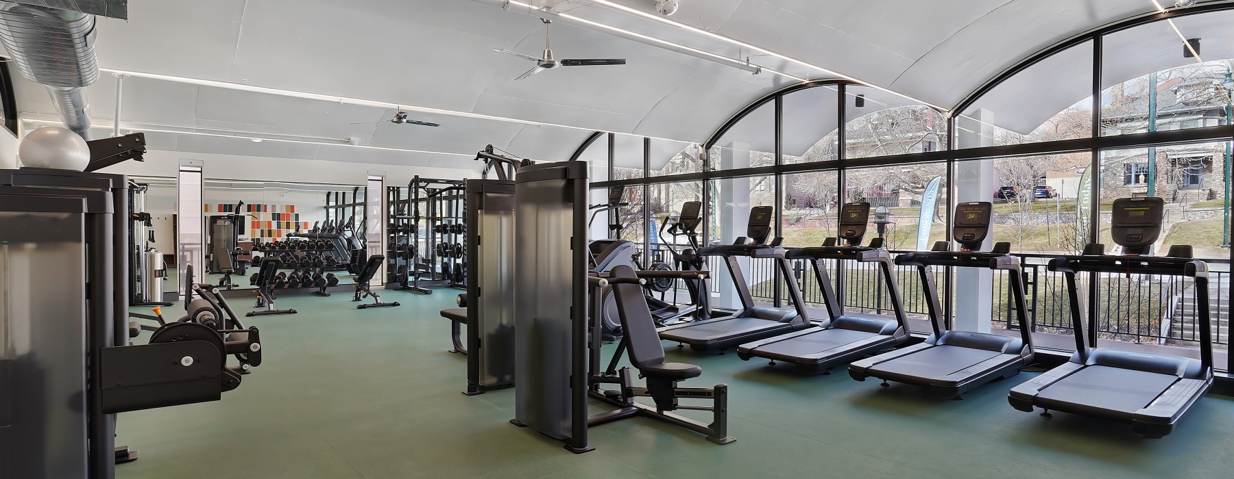 A fitness center with fitness equipment at The Source on South Temple luxury apartments in Salt Lake City, UT.