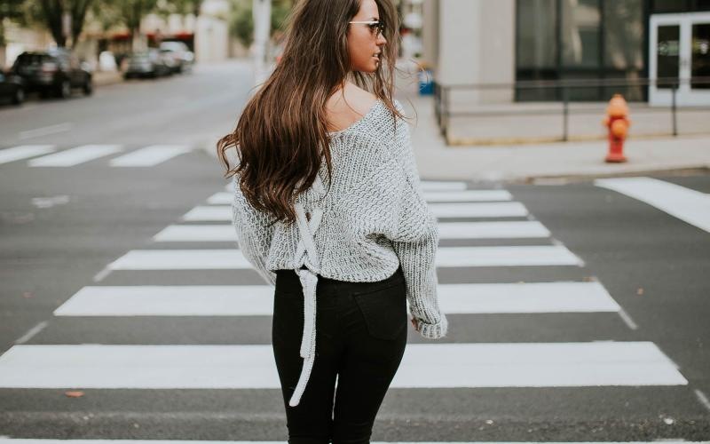 a person walking in a crosswalk